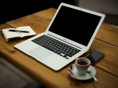 laptop sitting open on desk