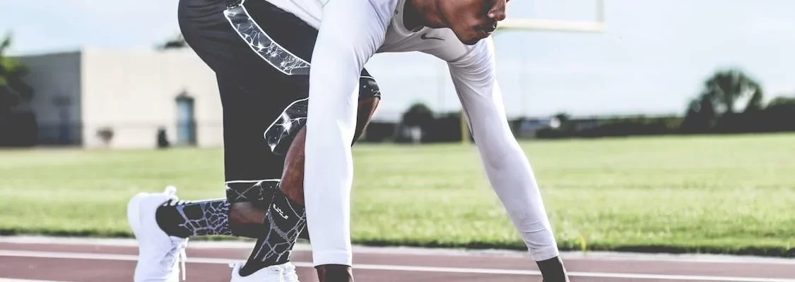 Athlete preparing for sprint.