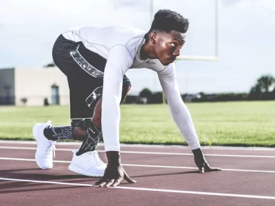 Athlete preparing for sprint.