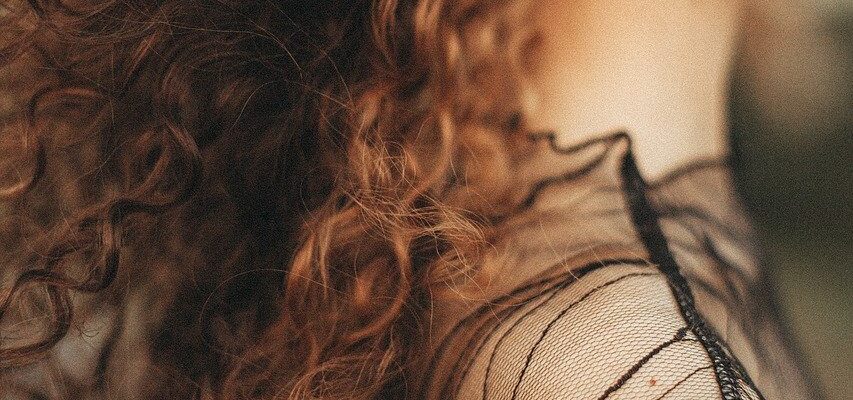 A girl with curly hair.