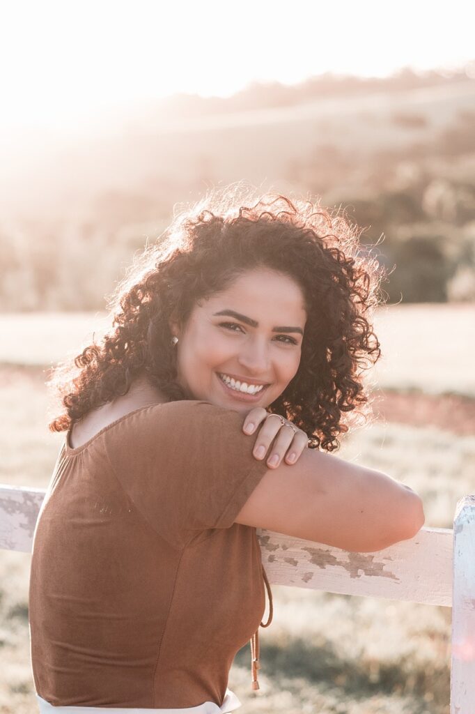 A woman smiling.