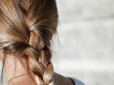 A woman's hair in a braid.