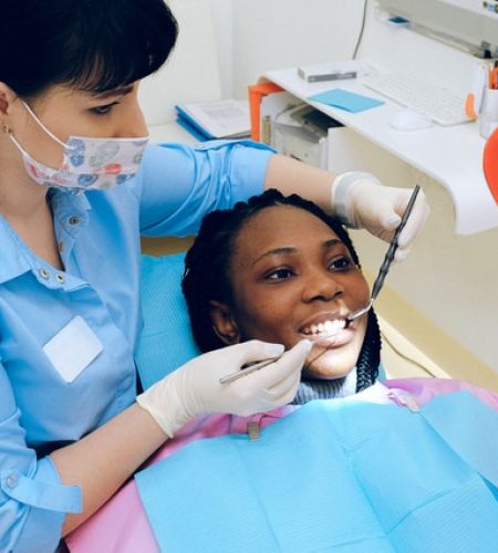 Woman getting work done at the dentist